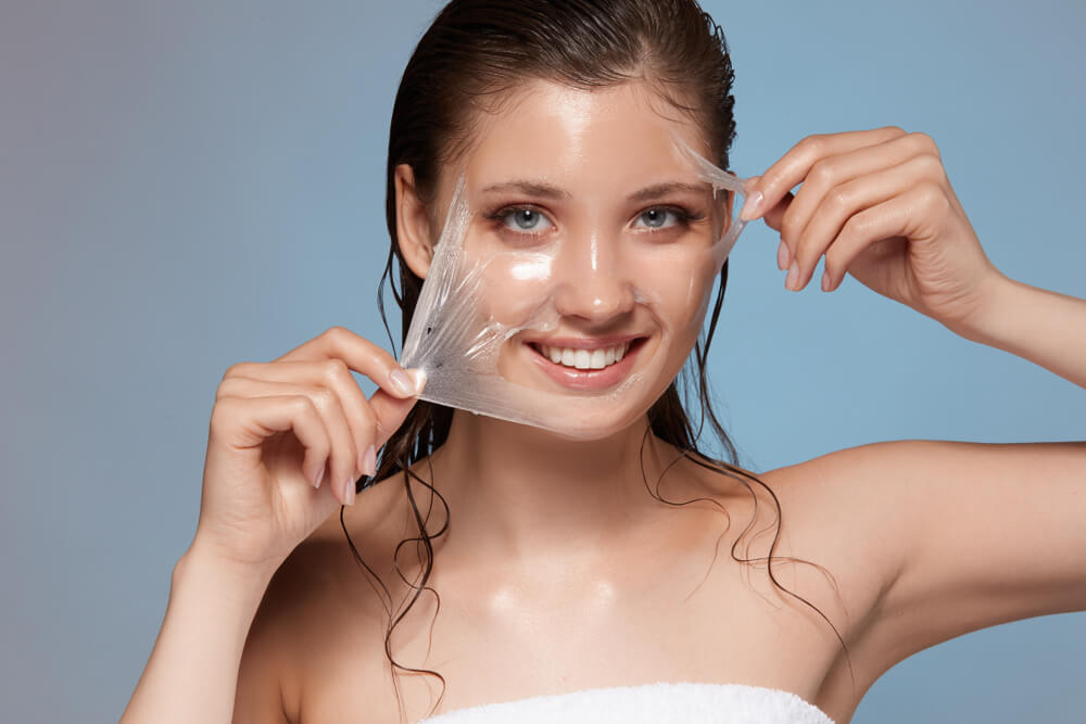 Young-looking woman with simulated peel of her skin