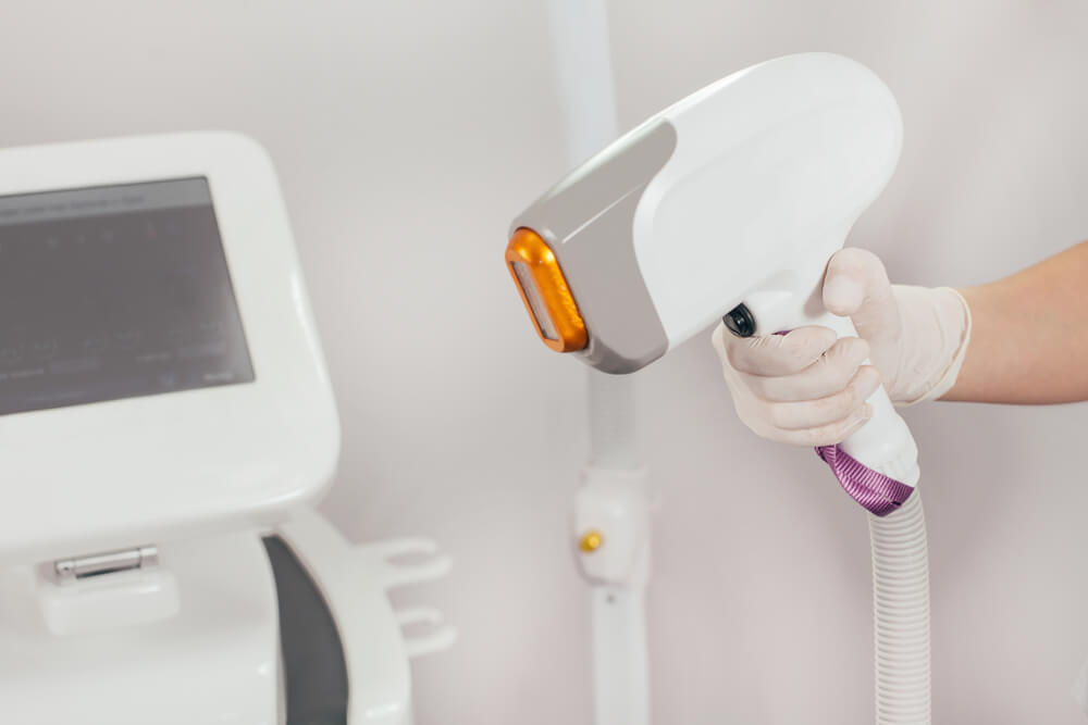 Laser hair removal machine in operation